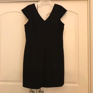 Black dress with gold zipper